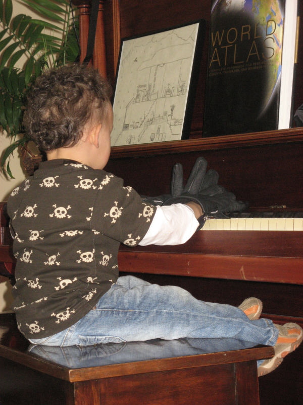 2007 02 10 It's hard to tickle the ivories with these ridiculous gloves on.