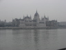 2007 02 19 Budapest 02 Parliament Buildings.  Budapest is divided in two by the Danube river, seen here.  Buda is the hilly side and Pest is rather flat.