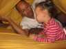 2007 10 15 When Sara was a kid, she and Chandra used to lie on my parents' bed and call out "we're thinking rocks" which meant we wanted my dad and mum to come up and try to pull us off the bed. In our family, the code is "family cuddles". We call it out,