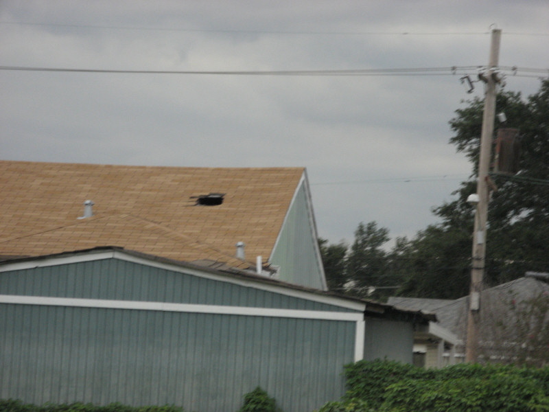2007 10 24 - NOLA - Somebody escaped through the hole they made in their roof