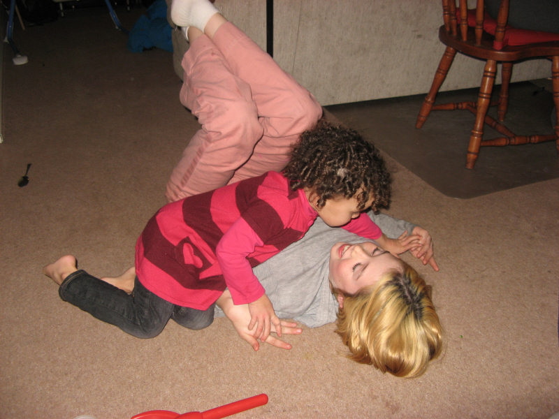 2007 12 15 Sara, the Grrrls and I stayed in Holland for Christmas this year.  Sara's parents (Robin and Jim), sister (Chandra), nephew and niece (Jake and Rhiannon) all came to stay with us.  Here's the start of the insanity. Ru and Rhi Play Moving Doll