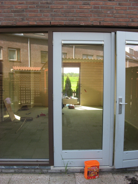 View into the Living-Dining Rooms from the Backyard