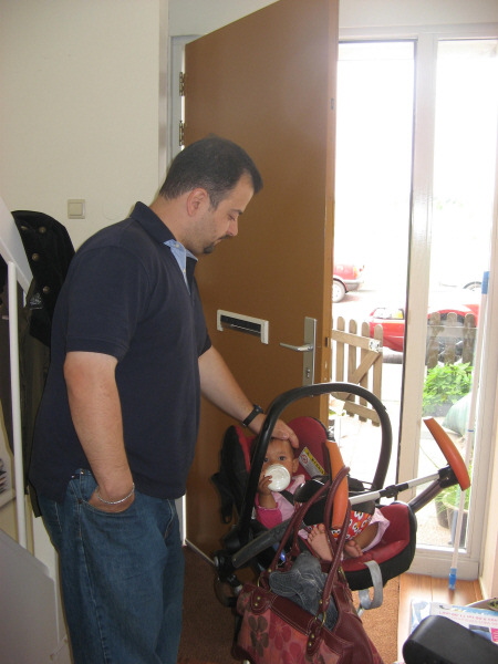 2008 06 21 Our friend Nick Eleftheriou from Westdale passed through Holland quickly and stopped by for a visit.  Here he is with Harper Baby.
