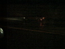 Barely visible shot at night on the highway.